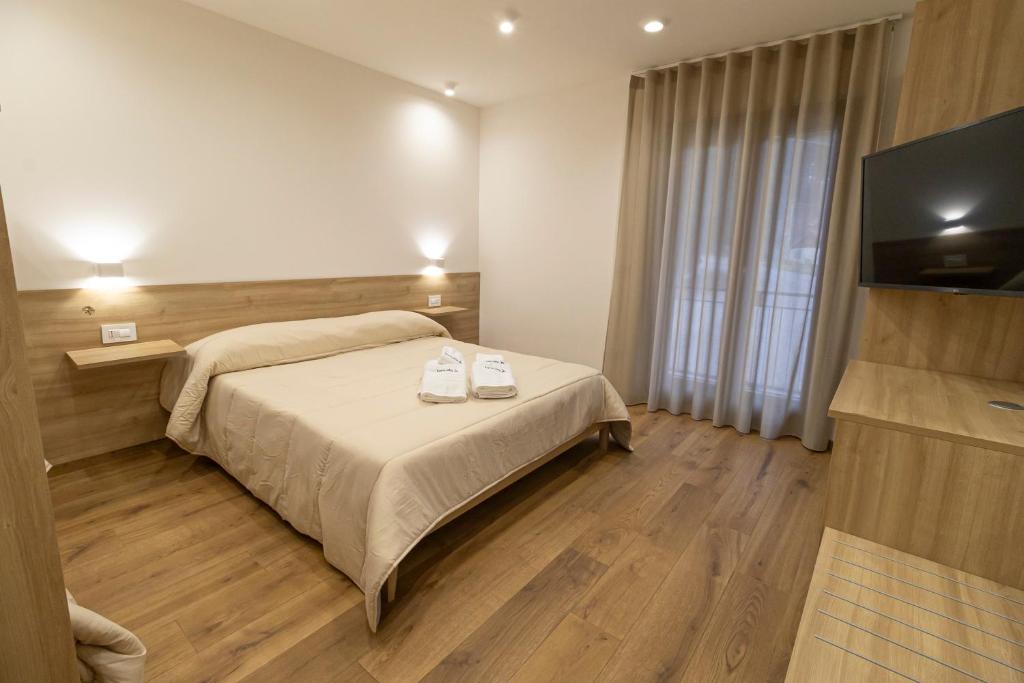 Postel nebo postele na pokoji v ubytování B&B Loricaly