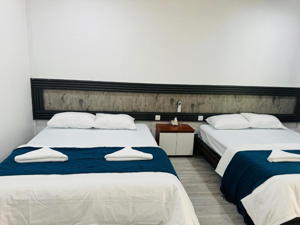 Postel nebo postele na pokoji v ubytování Real Hostel