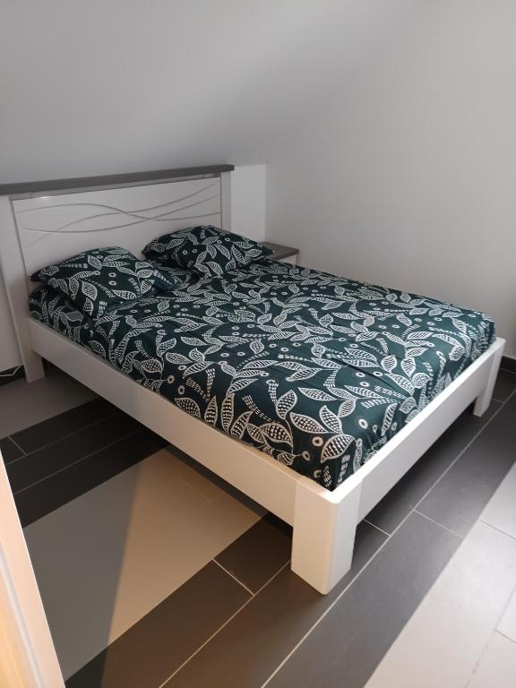 Postel nebo postele na pokoji v ubytování gîte dans endroit atypique