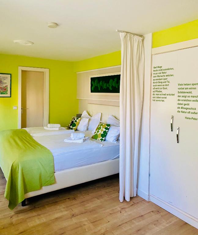 Postel nebo postele na pokoji v ubytování Central Boutique Hotel