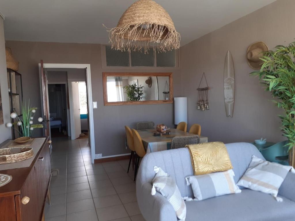 Χώρος καθιστικού στο Appartement face mer Rêve de Flo ts