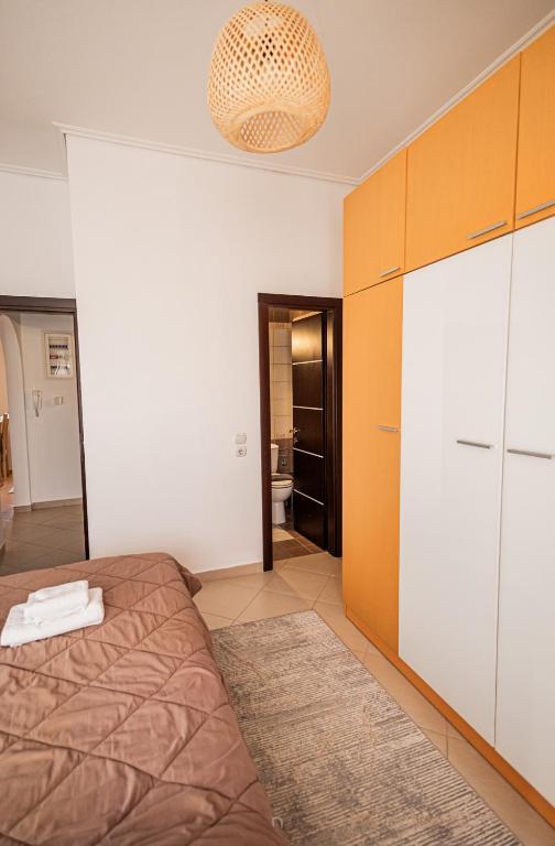 Postel nebo postele na pokoji v ubytování Ξενώνας Βυσωκά