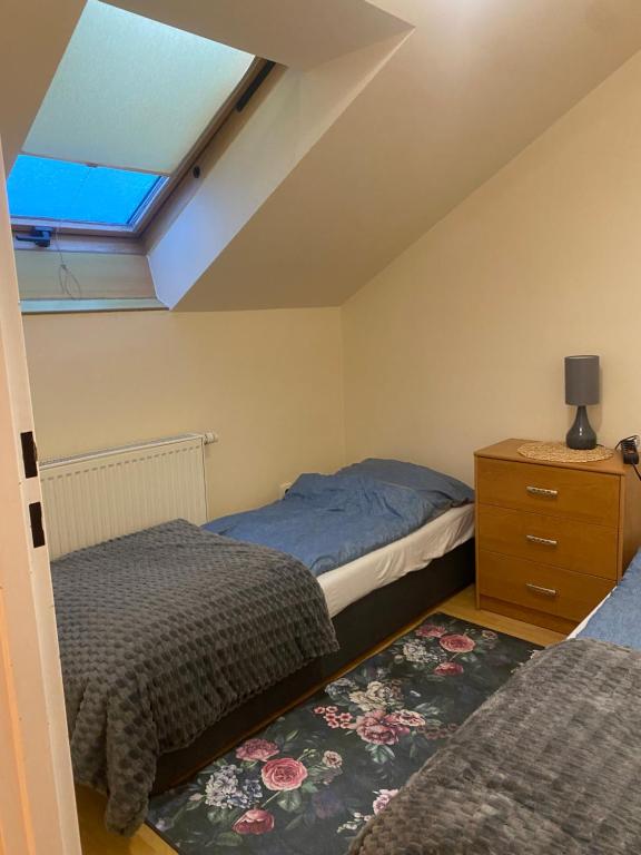 Posteľ alebo postele v izbe v ubytovaní Apartament u Piotra