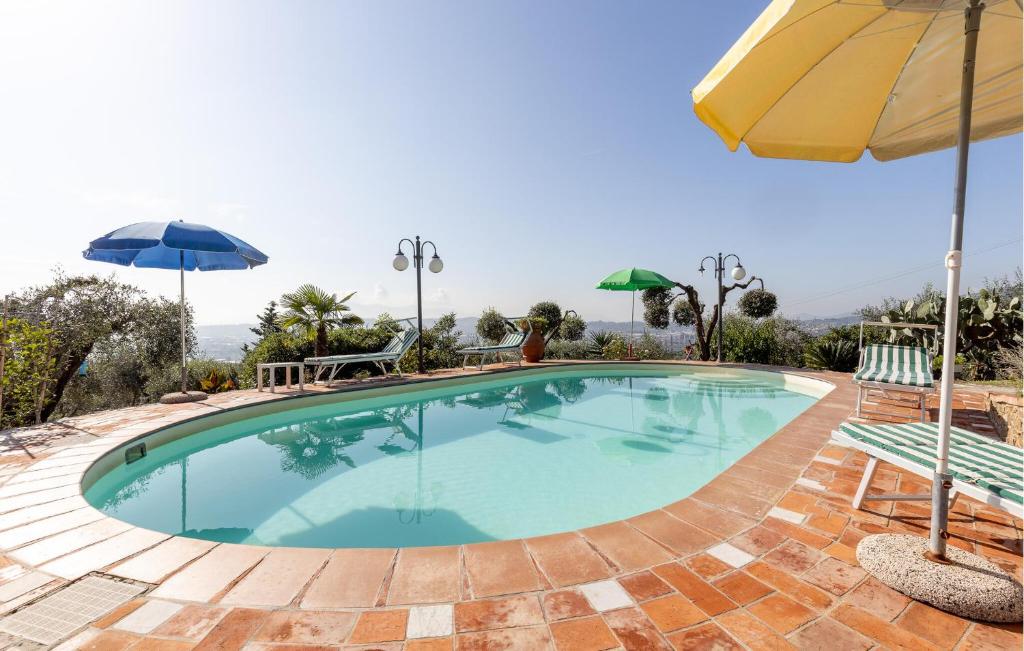 The swimming pool at or close to 3 Bedroom Stunning Home In Uzzano Pt