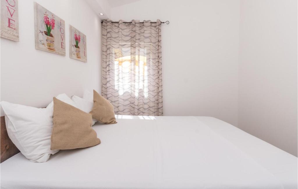 Posteľ alebo postele v izbe v ubytovaní Apartment Biograd 41