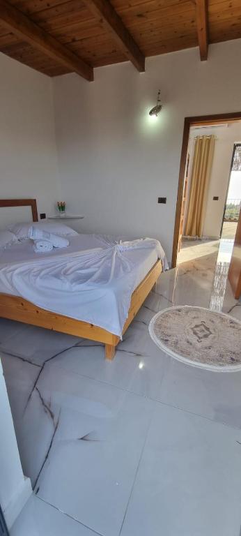 Postel nebo postele na pokoji v ubytování Hotel Restorant Olti