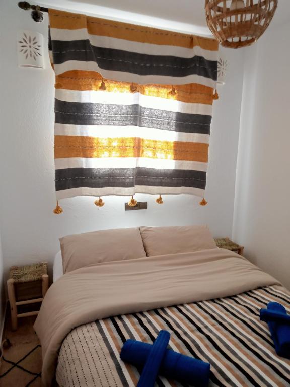 Postel nebo postele na pokoji v ubytování Dar Ouaco chambres d'hôtes