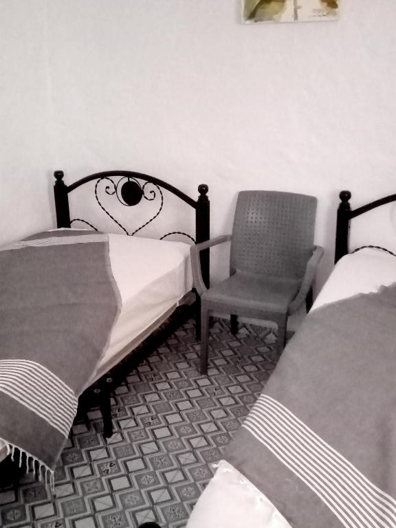 Postel nebo postele na pokoji v ubytování Dar Ouaco chambres d'hôtes