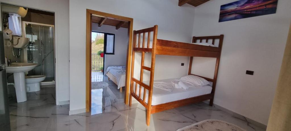 Postel nebo postele na pokoji v ubytování Hotel Restorant Olti
