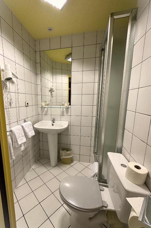 Koupelna v ubytování Dyke Hotel