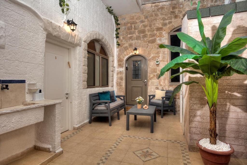 Posezení v ubytování בראשית - סוויטות בוטיק בצפת העתיקה - Beresheet - Boutique Suites in the Old City