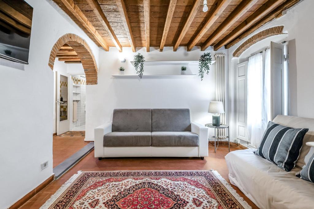 Ruang duduk di Hoslty-Suite l'Arancio-Enjoy the Historical Center