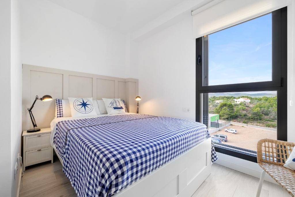 Posteľ alebo postele v izbe v ubytovaní Hauzify I Apartaments Roques Daurades