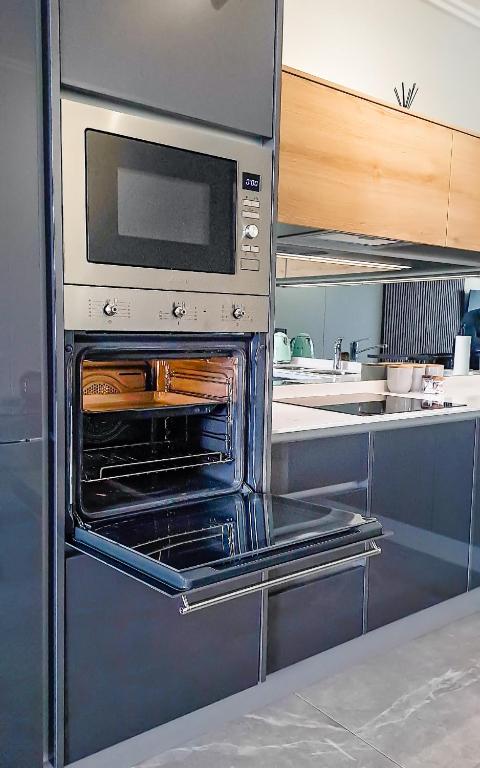 Kuchyň nebo kuchyňský kout v ubytování Ellipse Waterfall Executive Two Bedroom