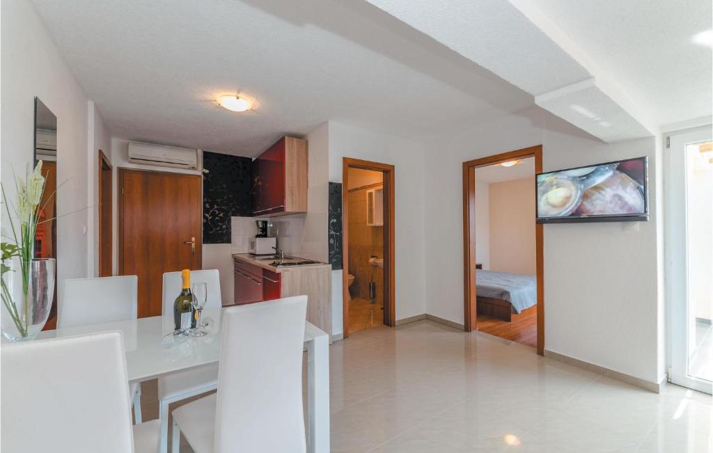 Televízia a/alebo spoločenská miestnosť v ubytovaní Apartment Biograd 2 Floor