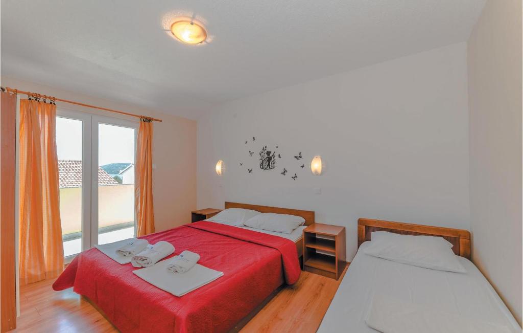 Posteľ alebo postele v izbe v ubytovaní Apartment Biograd 2 Floor