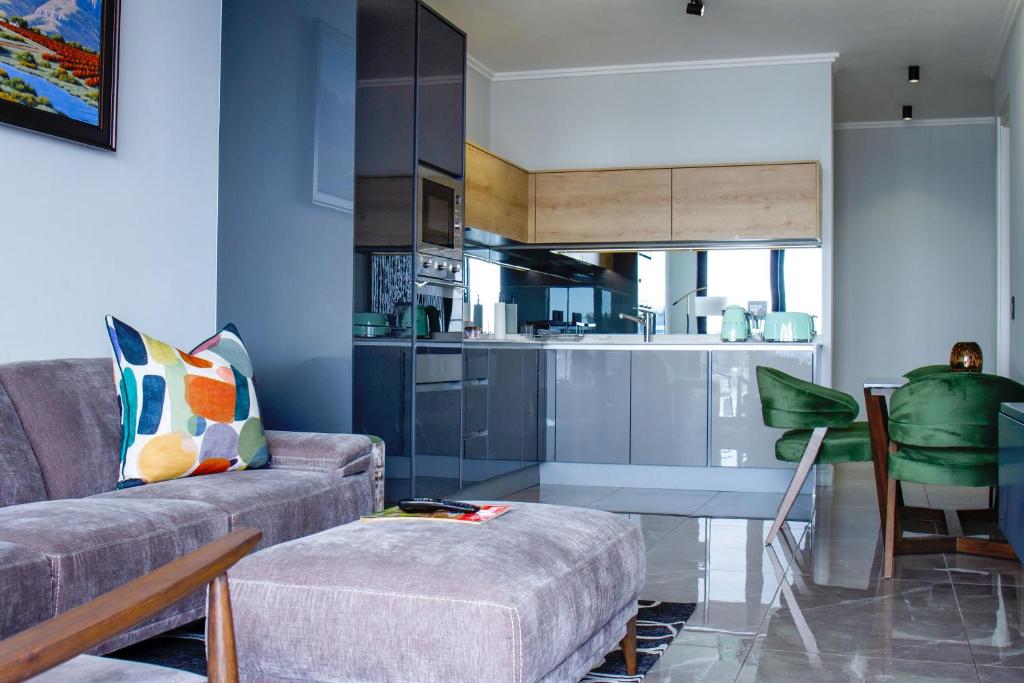 Posezení v ubytování Ellipse Waterfall Executive Two Bedroom