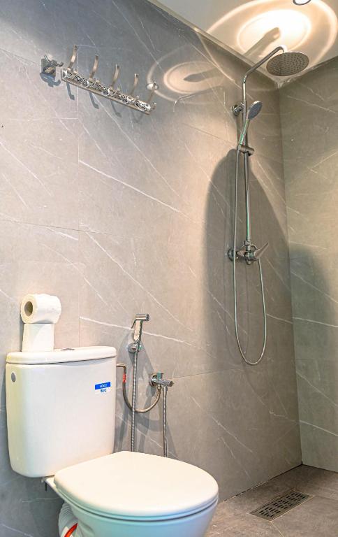 Ein Badezimmer in der Unterkunft Guest House Qodwa