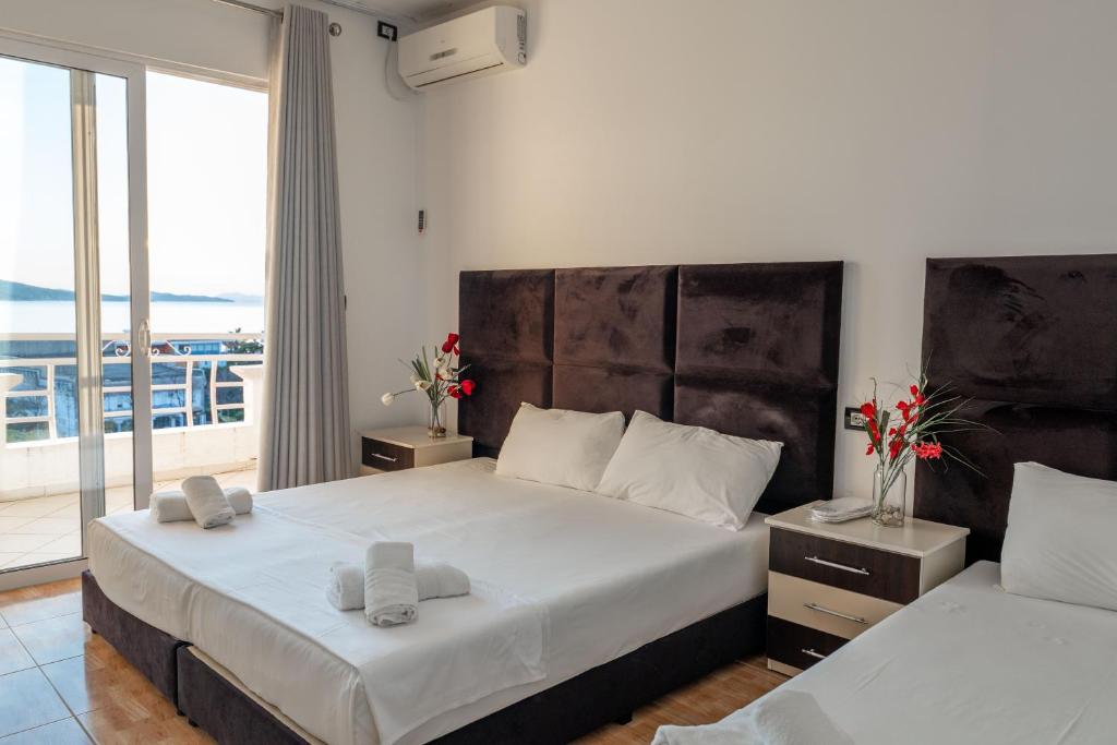 Postel nebo postele na pokoji v ubytování Hotel Myrtai - City Center