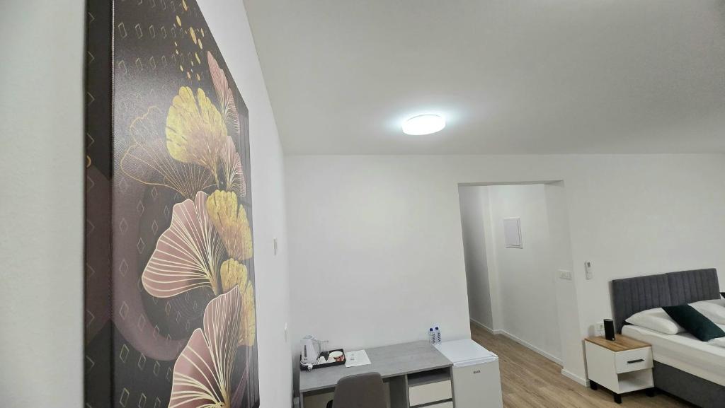 Postel nebo postele na pokoji v ubytování Hotel MM Residence