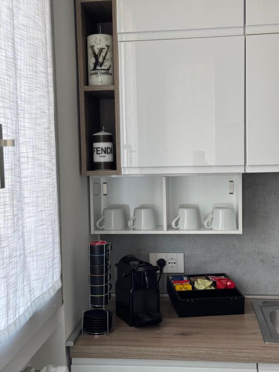 Kuchyň nebo kuchyňský kout v ubytování B&B Prestige