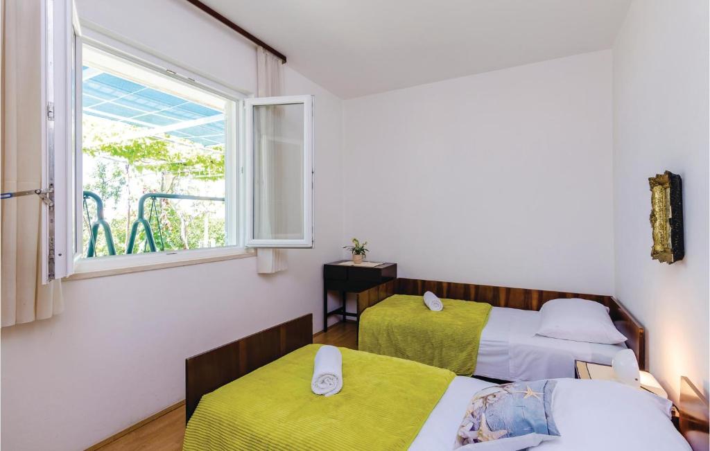 Posteľ alebo postele v izbe v ubytovaní Apartment Senj Cr