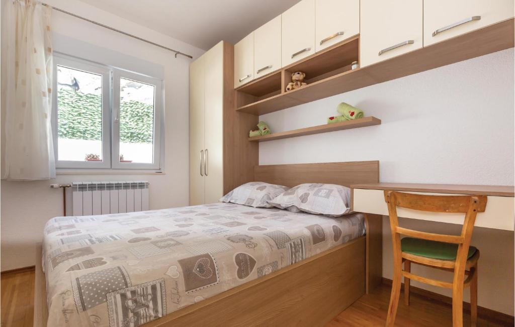 Posteľ alebo postele v izbe v ubytovaní 3 Bedroom Awesome Home In Zagvozd