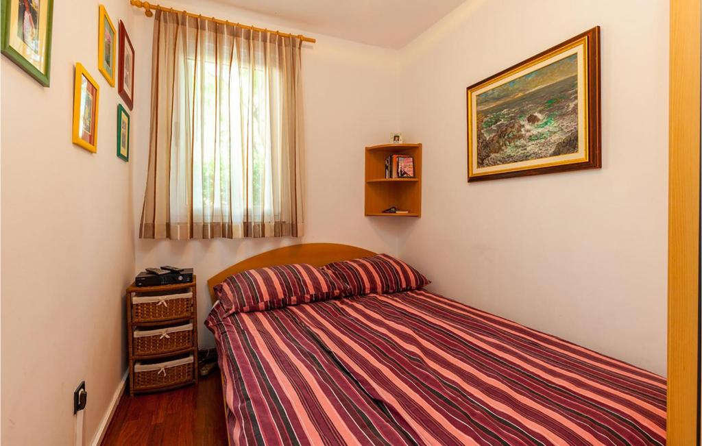 Posteľ alebo postele v izbe v ubytovaní Nice Home In Crikvenica With Kitchen