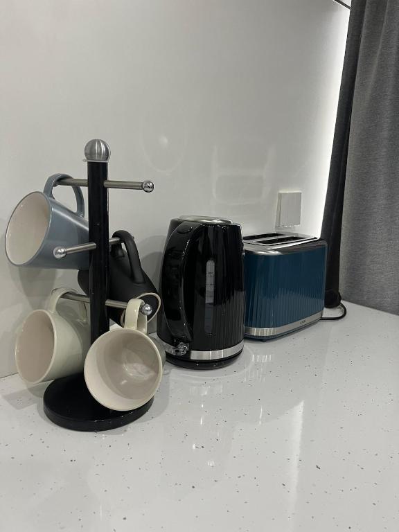 Příslušenství pro přípravu čaje a kávy v ubytování Pringle Pod