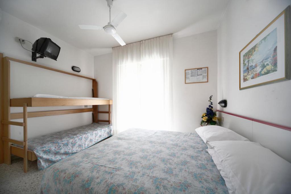 Postel nebo postele na pokoji v ubytování Hotel Lara