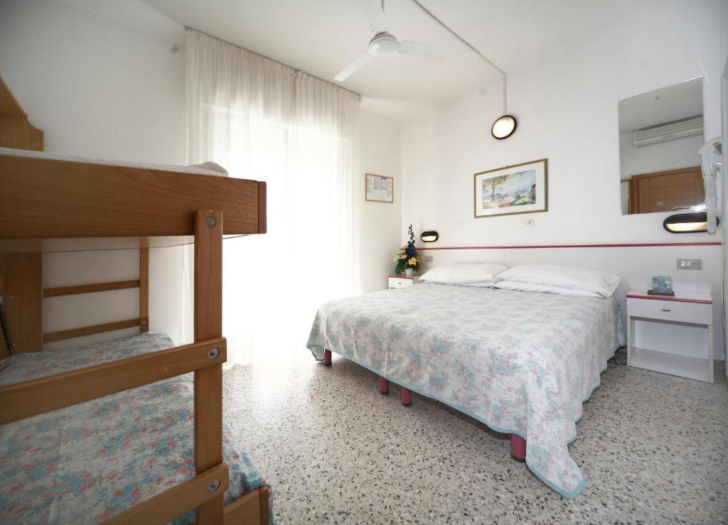 Postel nebo postele na pokoji v ubytování Hotel Lara