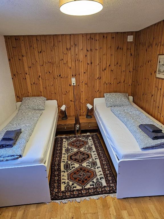 Postel nebo postele na pokoji v ubytování 5 Zimmer-Wohnung mit Garage und Sauna