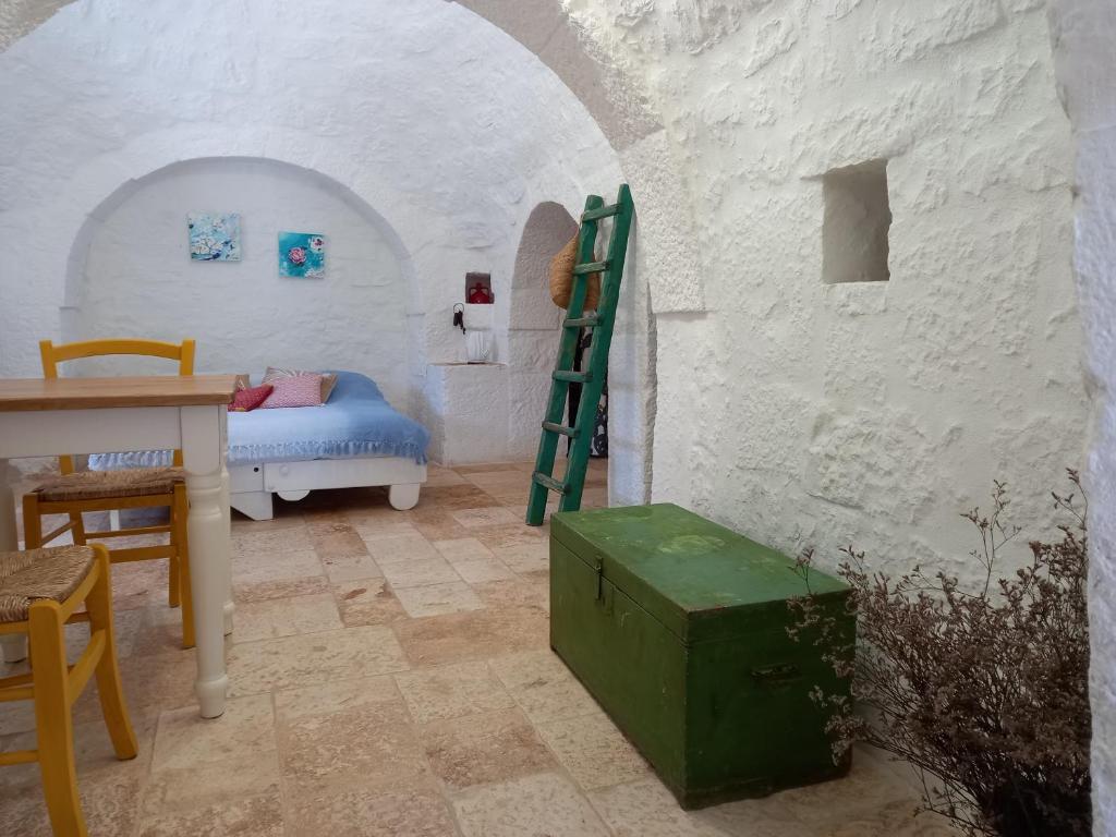 A bed or beds in a room at Trullo Margherita