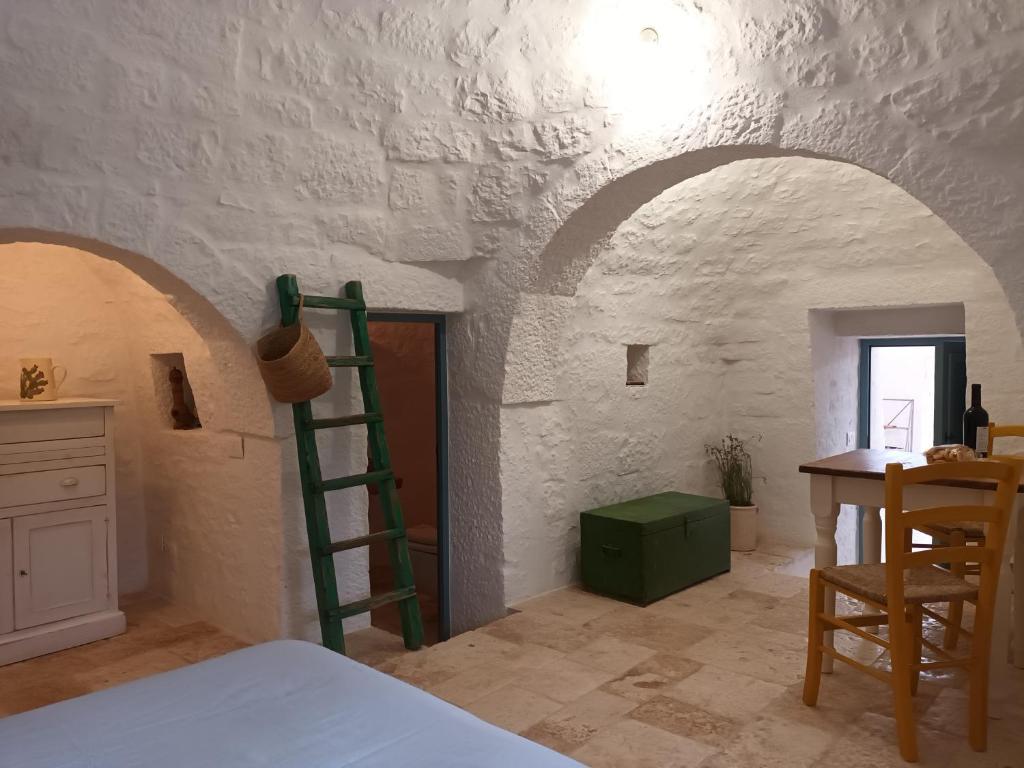 A bed or beds in a room at Trullo Margherita