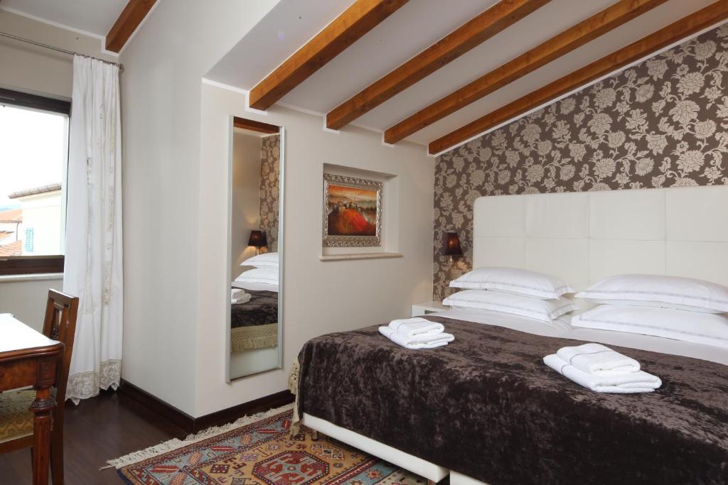 Posteľ alebo postele v izbe v ubytovaní Boutique Hotel Vela Vrata