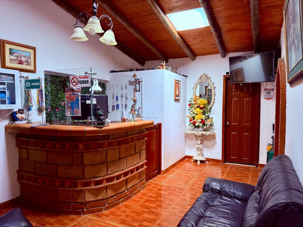Posezení v ubytování HOTEL HOSTERIA la PINTADA