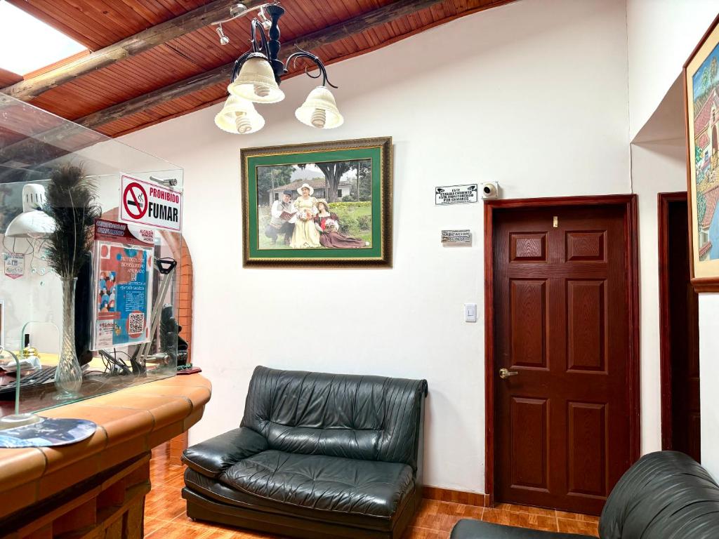Posezení v ubytování HOTEL HOSTERIA la PINTADA
