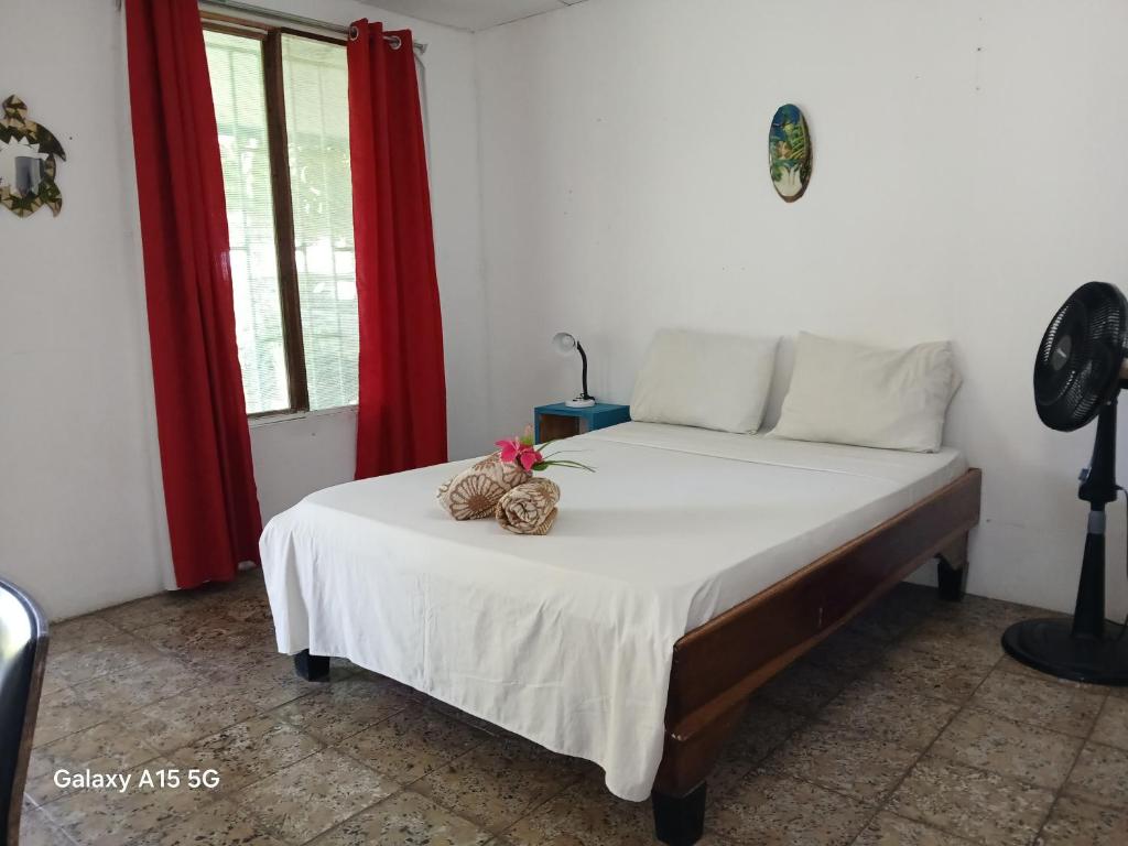 Postel nebo postele na pokoji v ubytování Amapola Rooms