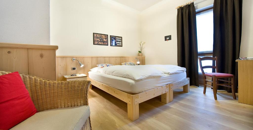 Posteľ alebo postele v izbe v ubytovaní Hotel Alegra