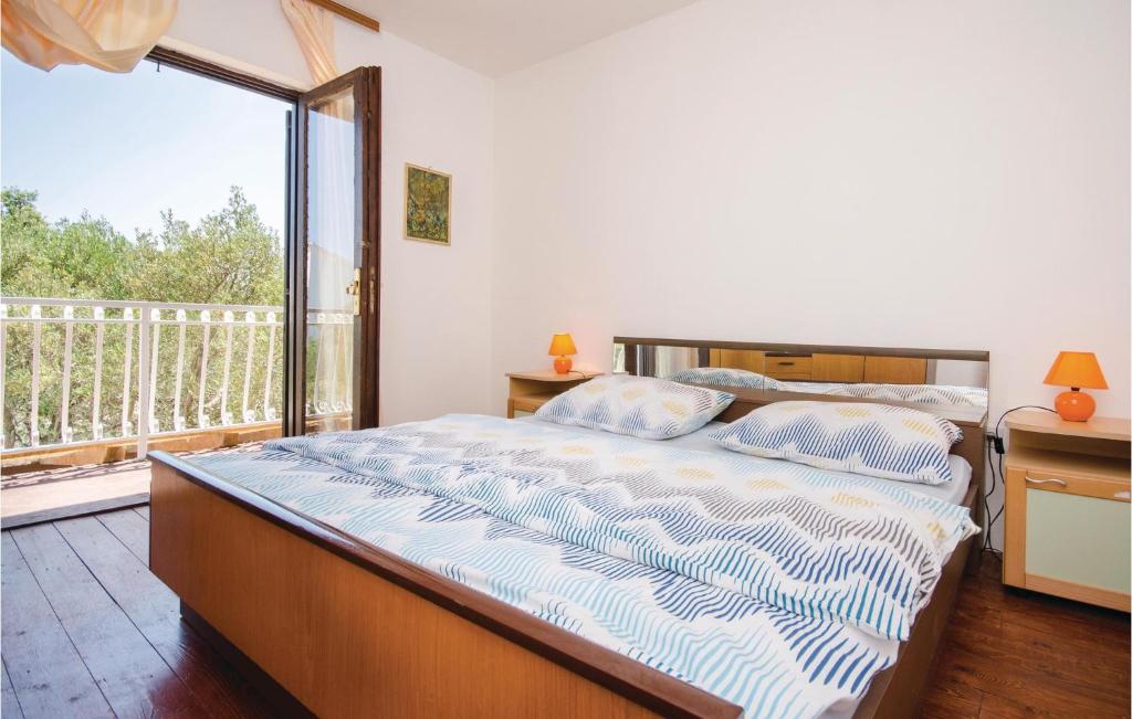Posteľ alebo postele v izbe v ubytovaní Holiday Home Vinisce With Sea View I