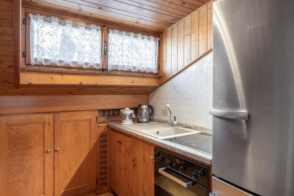 Kuchyň nebo kuchyňský kout v ubytování ATTICO Lodge