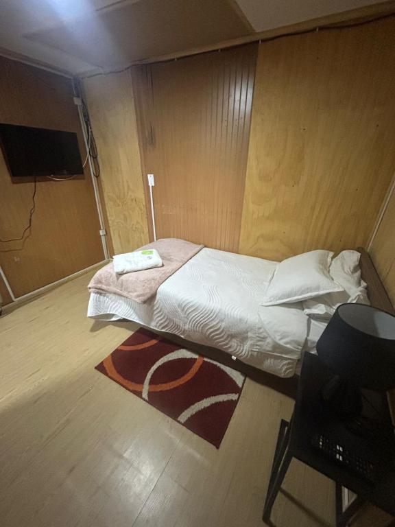 Postel nebo postele na pokoji v ubytování Hostal Reymar