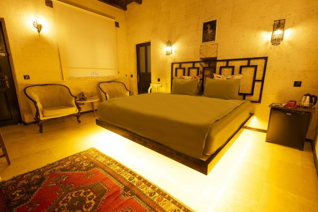 Postel nebo postele na pokoji v ubytování Drala Inn Cappadocia