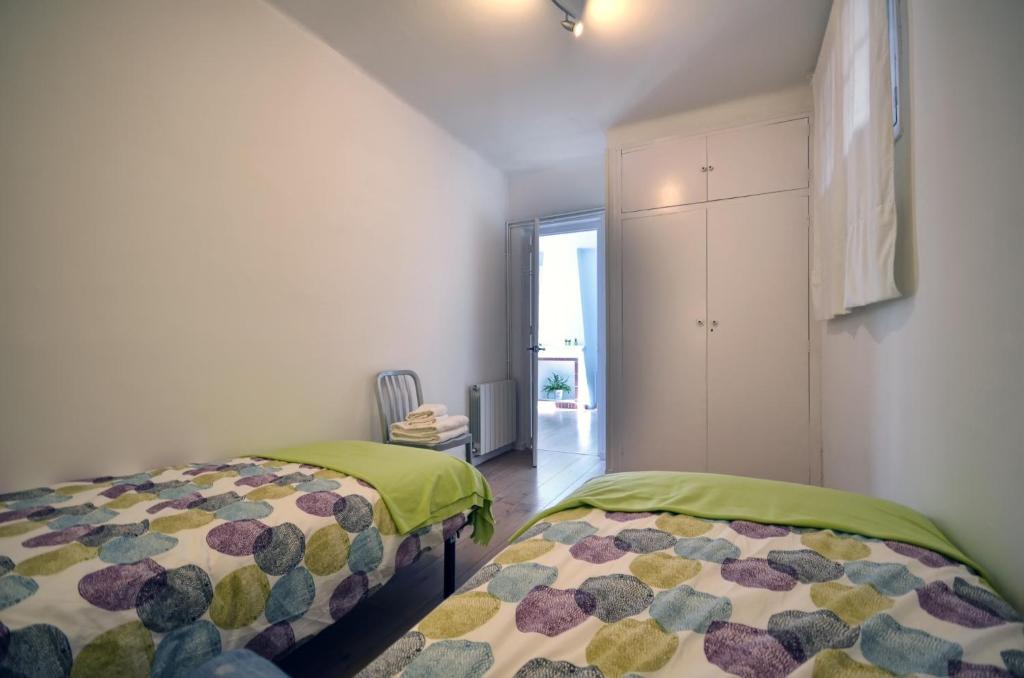Postel nebo postele na pokoji v ubytování Sunny Apartment Central Sitges