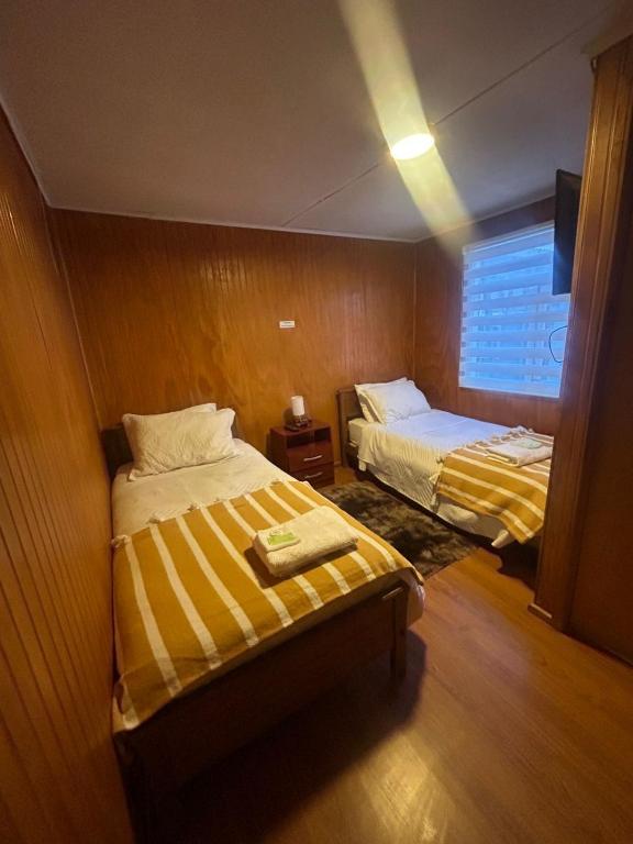 Postel nebo postele na pokoji v ubytování Hostal Reymar