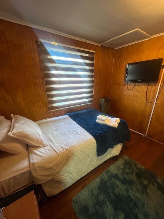 Postel nebo postele na pokoji v ubytování Hostal Reymar