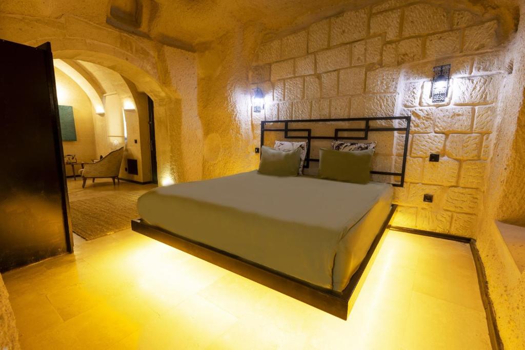 Postel nebo postele na pokoji v ubytování Drala Inn Cappadocia