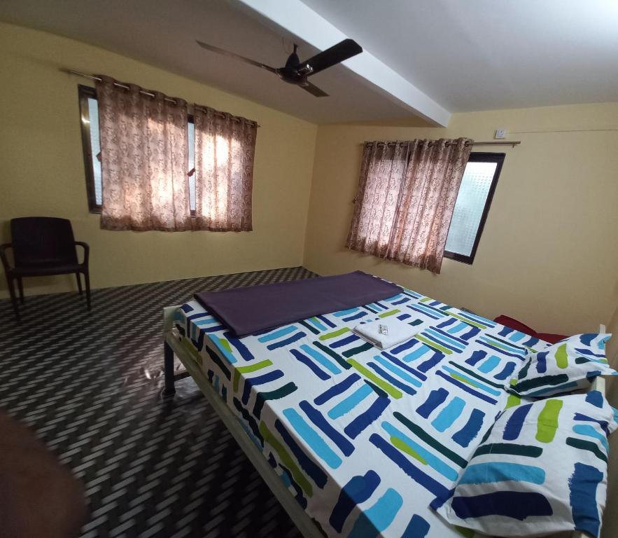 Postel nebo postele na pokoji v ubytování Juis Homestay Near Beach Property