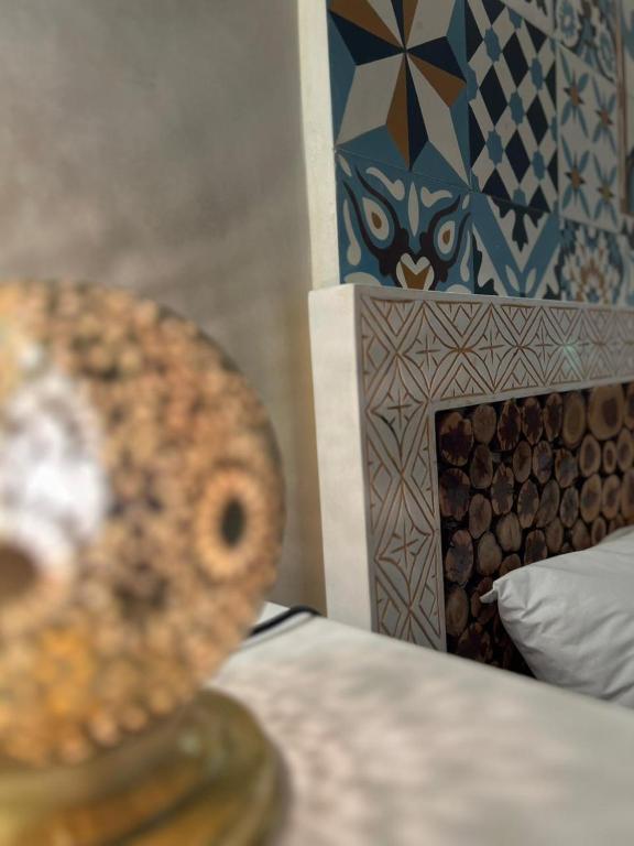 Postel nebo postele na pokoji v ubytování Riad dar Hania