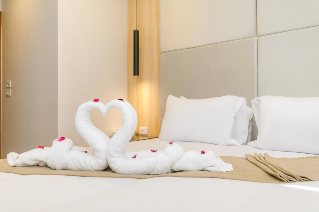 Postel nebo postele na pokoji v ubytování Tiye Pyramids Hotel